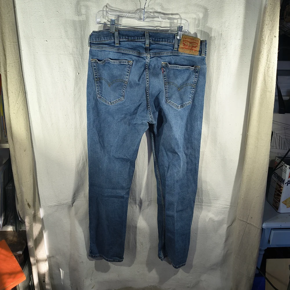 Levi's 505 Men's Size 38 X 32 Light Blue Distressed Straight Jeans